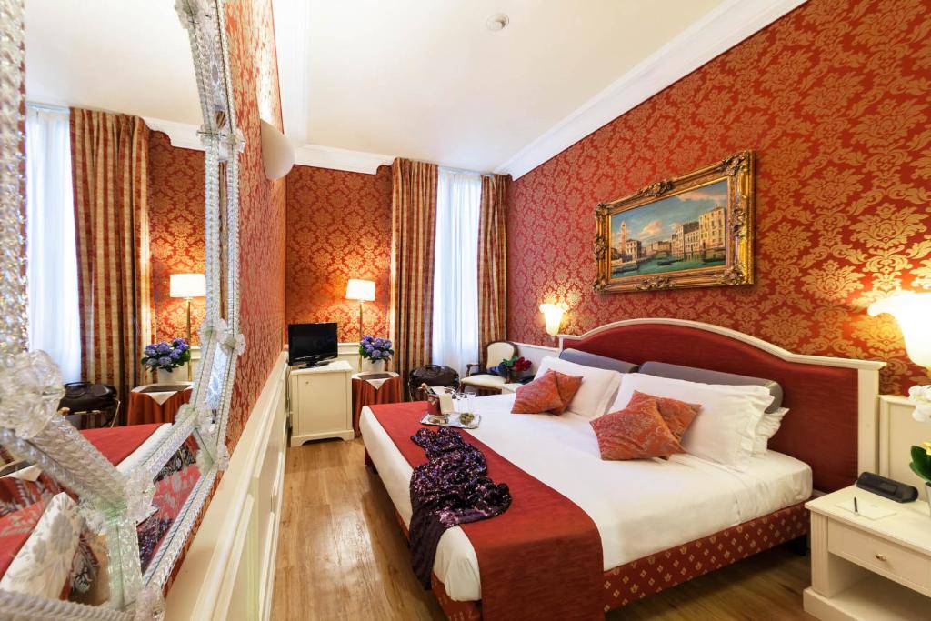 Łóżko lub łóżka w pokoju w obiekcie Duodo Palace