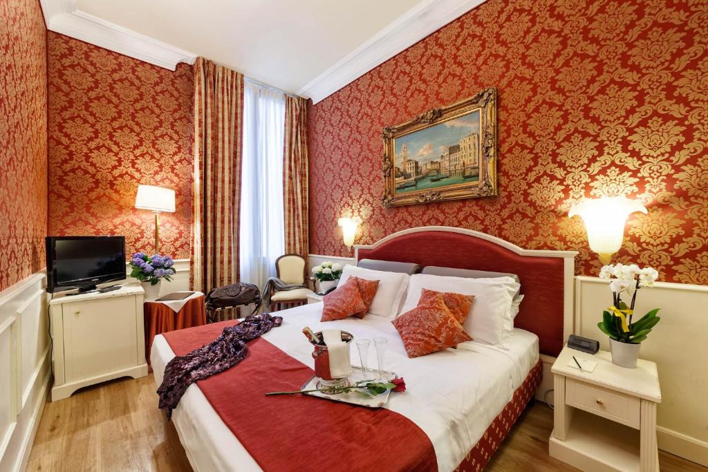 Łóżko lub łóżka w pokoju w obiekcie Duodo Palace