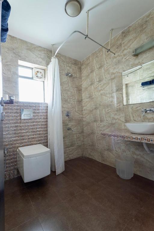 Koupelna v ubytování Arotel Rooms & Suites Calangute