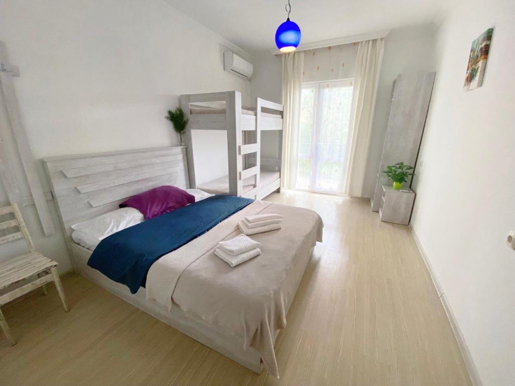 Postel nebo postele na pokoji v ubytování Guest house Junona