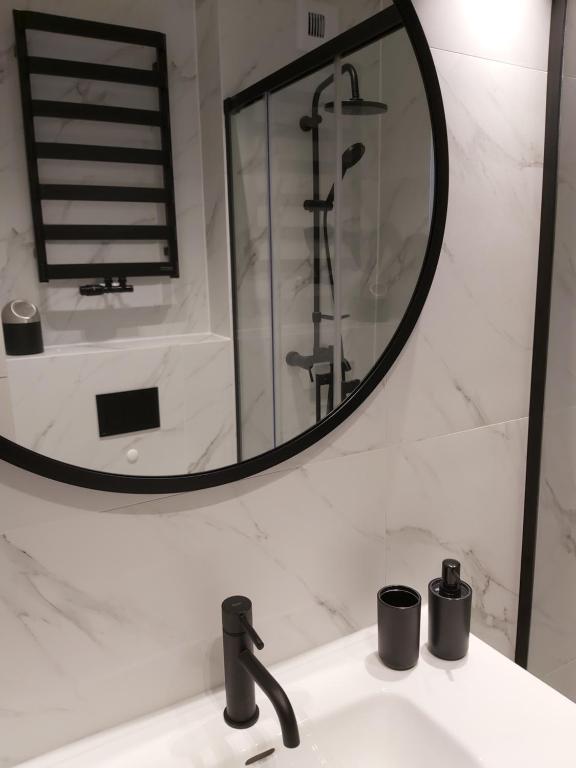 Kúpeľňa v ubytovaní Apartament 150 Zaspa VVita