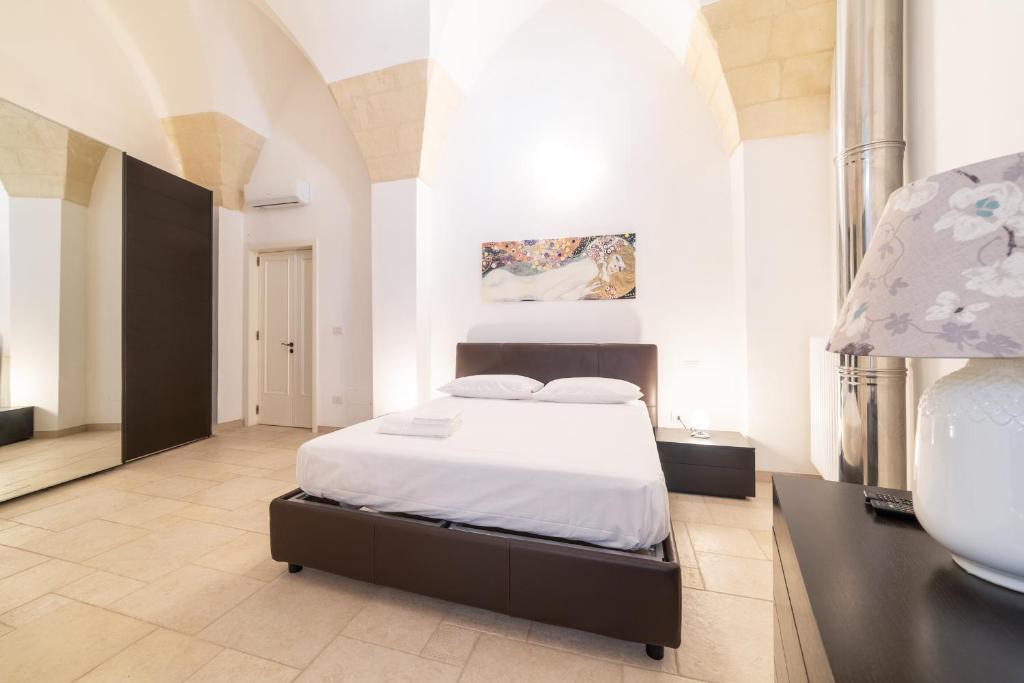 Posteľ alebo postele v izbe v ubytovaní Milestone Inn Lecce