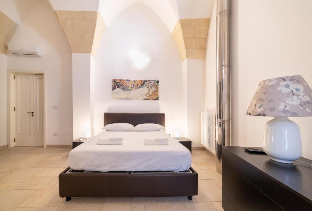 Posteľ alebo postele v izbe v ubytovaní Milestone Inn Lecce