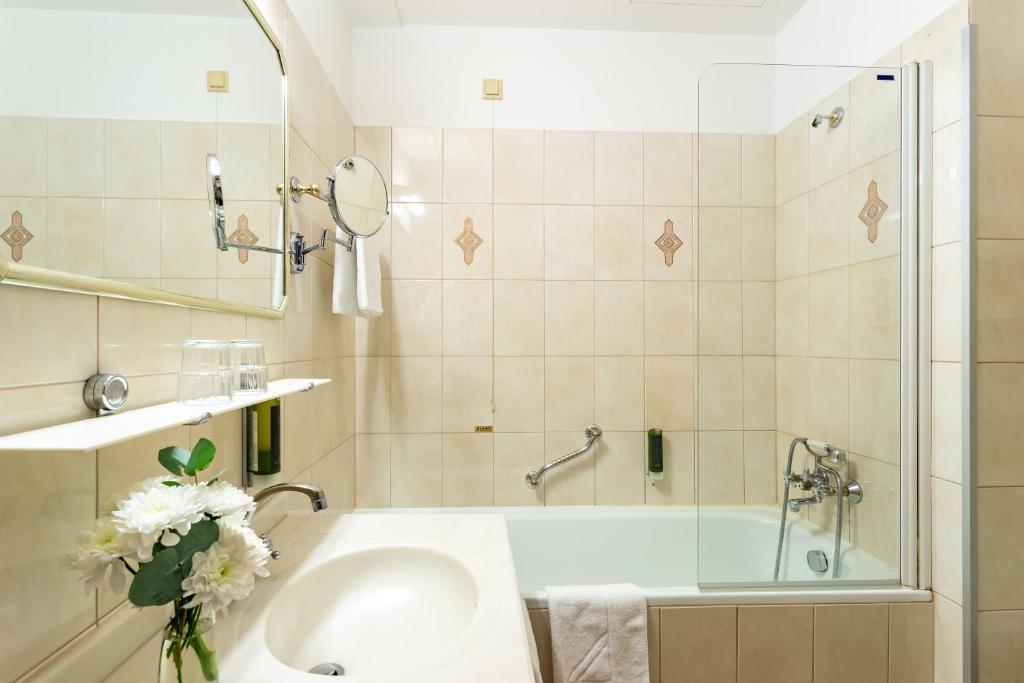 Koupelna v ubytování Theaterhotel & Suites Wien