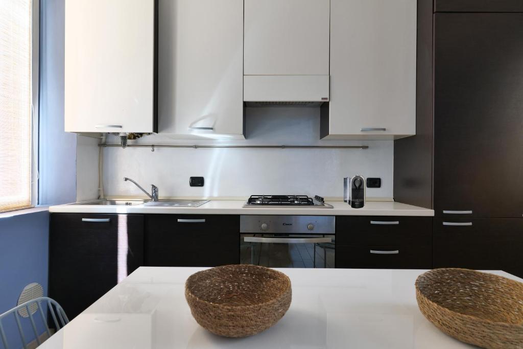 Kuchyňa alebo kuchynka v ubytovaní Charming 5 Vie Apt. Milan Center