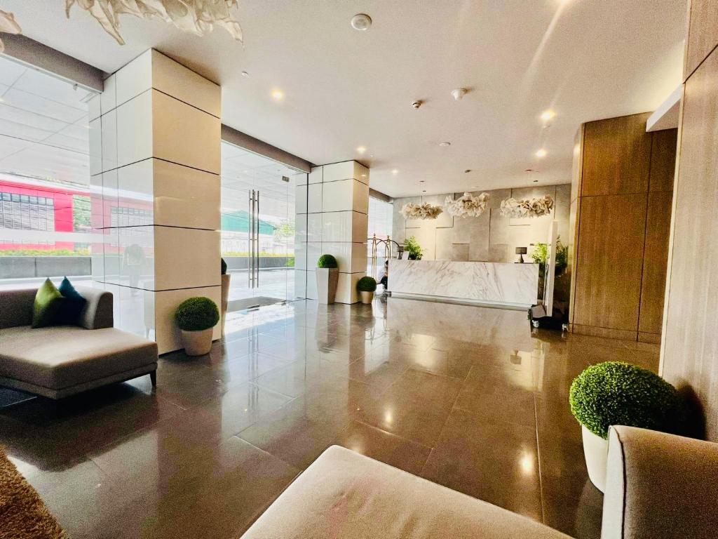 Posezení v ubytování AEON TOWERS STUDIO SUITE (by:skyspottravelcentra)