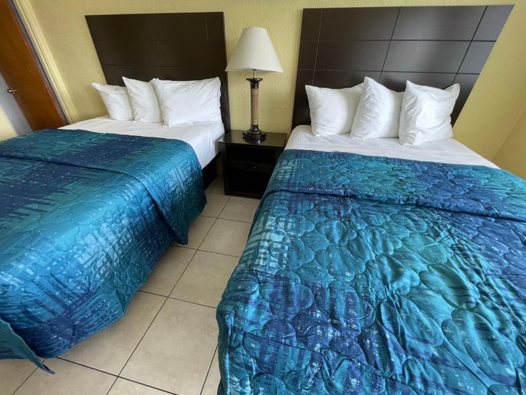Sandy Shores Resort - Standaard Kamer Met Twee Tweepersoonsbedden En Uitzicht Op Het Zwembad