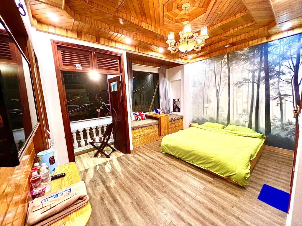 Una cama o camas en una habitación de Nấm Home