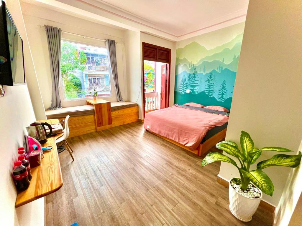 Una cama o camas en una habitación de Nấm Home