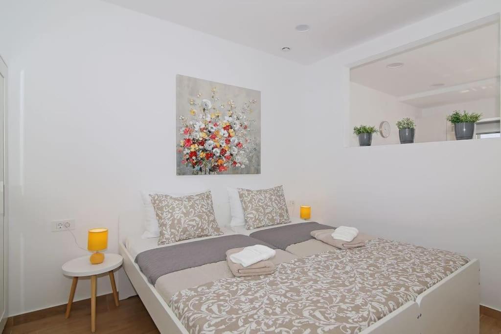 Posteľ alebo postele v izbe v ubytovaní Studio Apartman Karlita