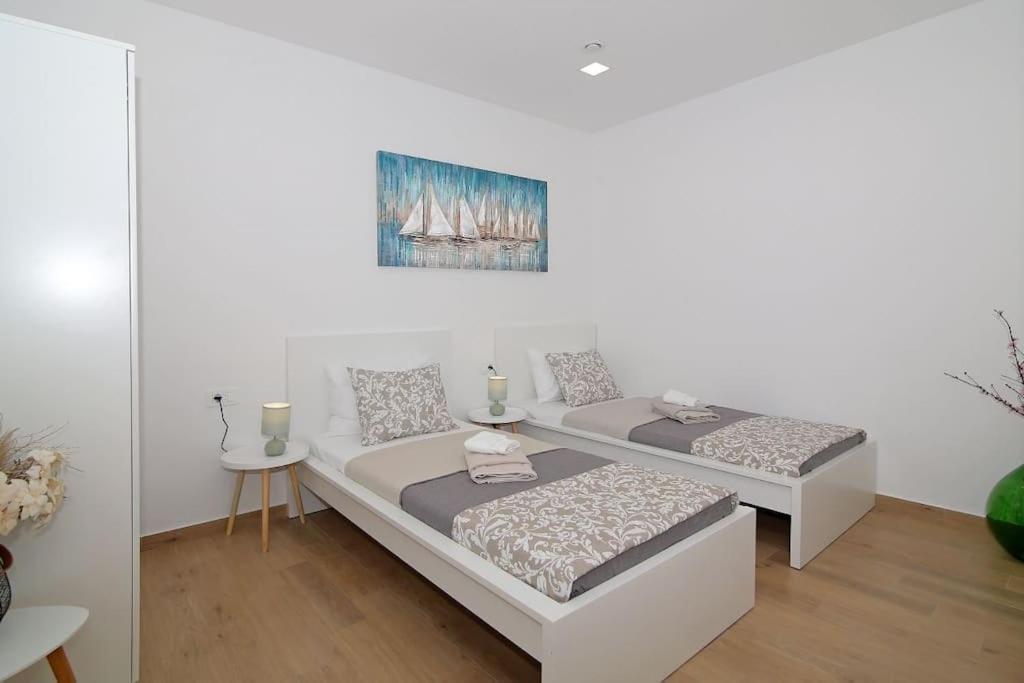 Posteľ alebo postele v izbe v ubytovaní Studio Apartman Karlita