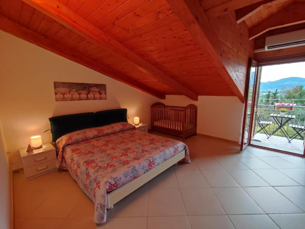 Łóżko lub łóżka w pokoju w obiekcie Casa Elena
