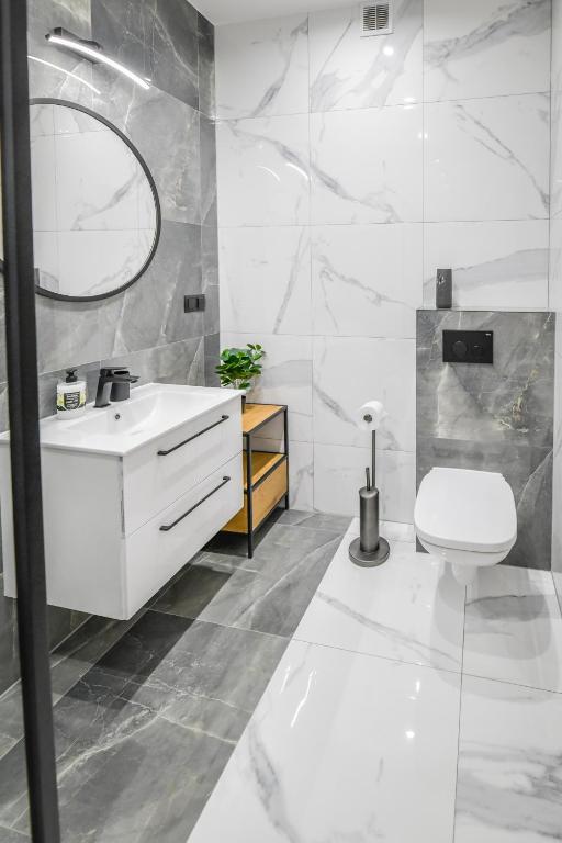 Kúpeľňa v ubytovaní Apartament Komfort 17