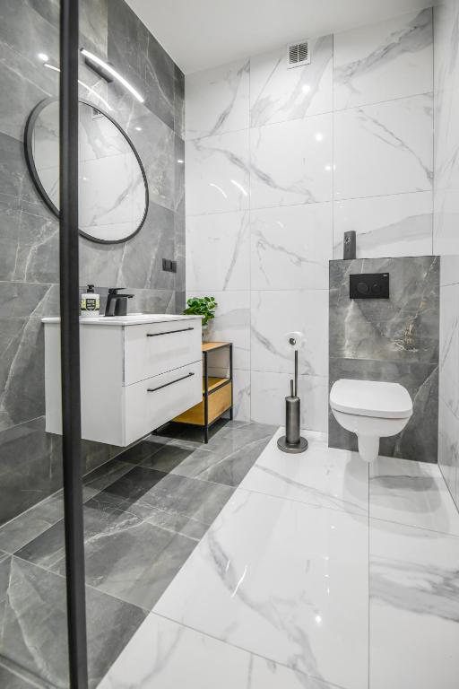 Kúpeľňa v ubytovaní Apartament Komfort 17