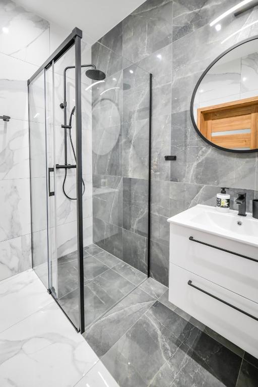 Kúpeľňa v ubytovaní Apartament Komfort 17