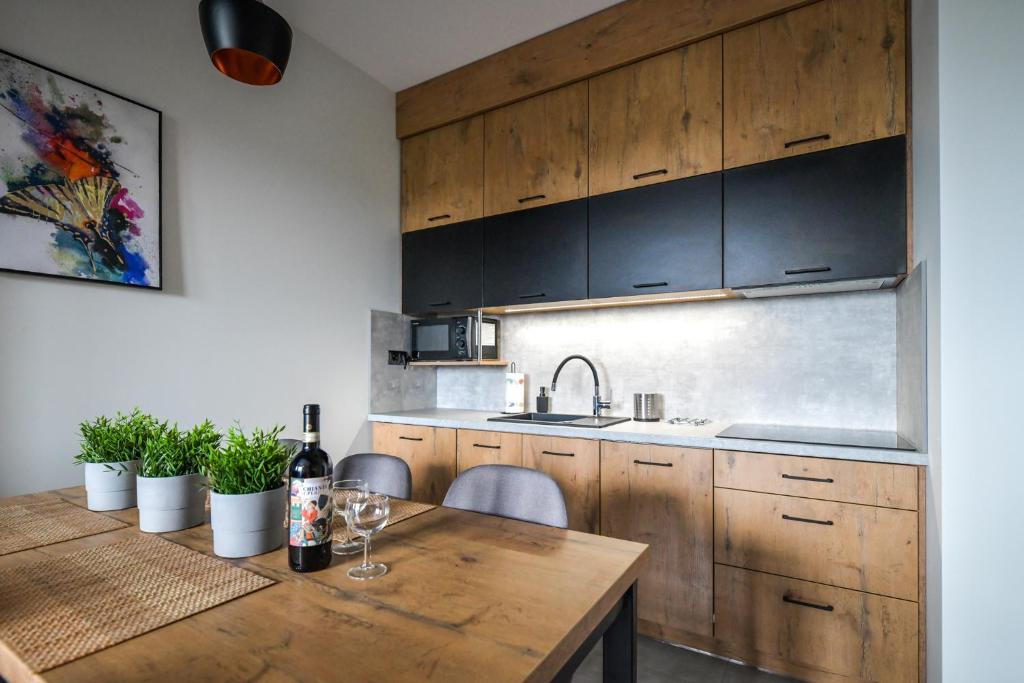 Kuchyňa alebo kuchynka v ubytovaní Apartament Komfort 17