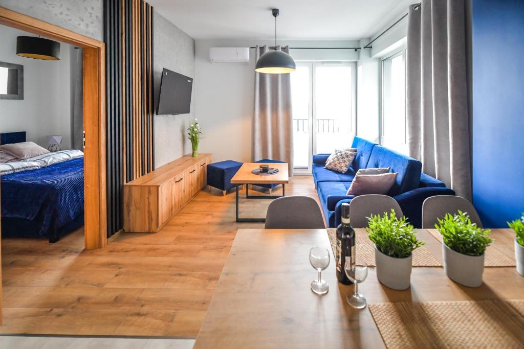Posteľ alebo postele v izbe v ubytovaní Apartament Komfort 17