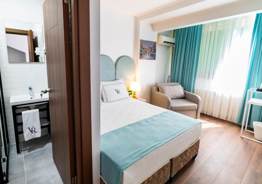 מיטה או מיטות בחדר ב-Hotel Vera