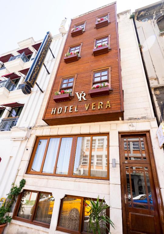 a building with a hotel vera sign on it at Cheers Vera Edition Hotel in Istanbul