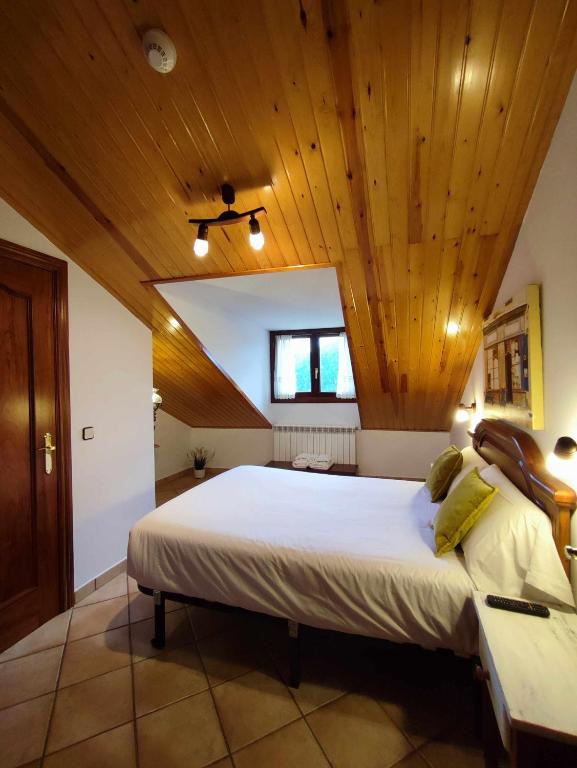 Postel nebo postele na pokoji v ubytování Hotel Rural LAbadia de Sieste