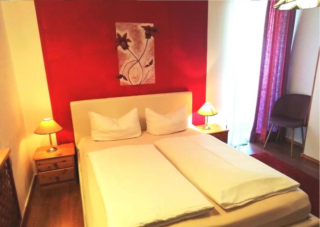 Postel nebo postele na pokoji v ubytování Hotel Pfaff