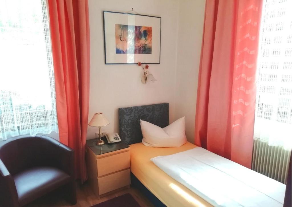 Postel nebo postele na pokoji v ubytování Hotel Pfaff
