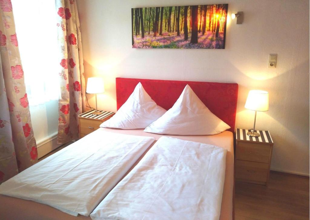 Postel nebo postele na pokoji v ubytování Hotel Pfaff