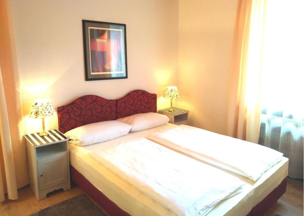 Postel nebo postele na pokoji v ubytování Hotel Pfaff