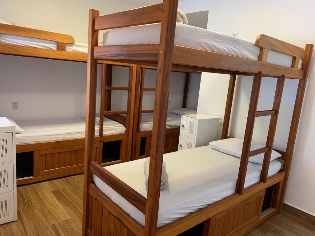 Postel nebo postele na pokoji v ubytování Lila Limao Hostel