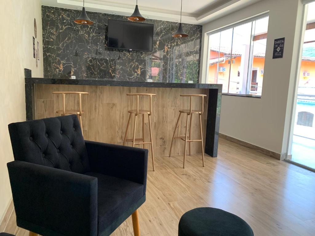 Posezení v ubytování Lila Limao Hostel