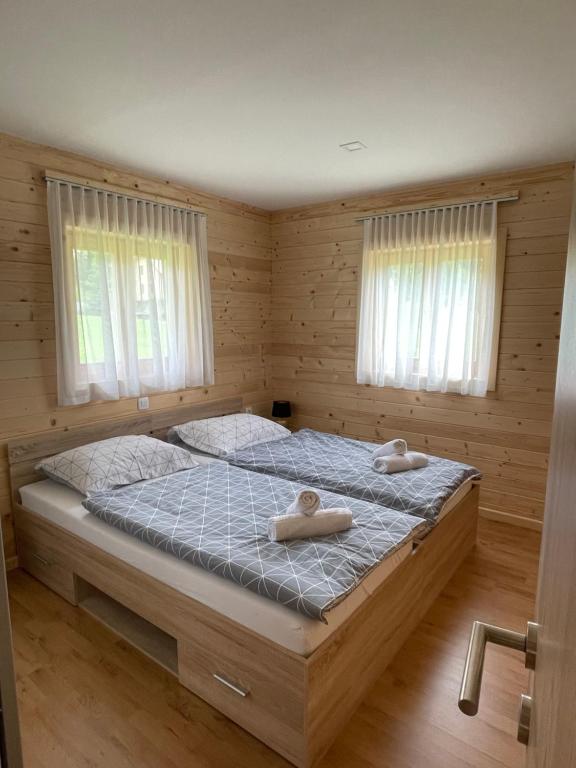 Postel nebo postele na pokoji v ubytování Martinova izba - Family Bungalows