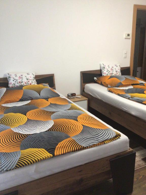 Posteľ alebo postele v izbe v ubytovaní Nina Apartment