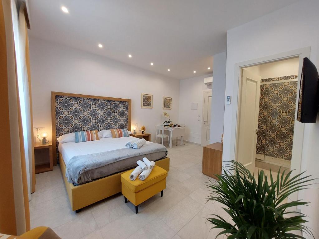Postel nebo postele na pokoji v ubytování Mistral Luxury Suites