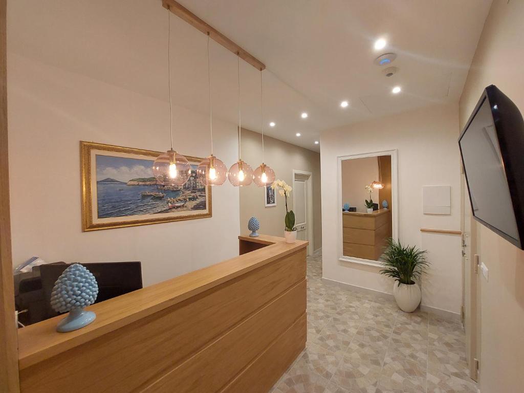 TV a/nebo společenská místnost v ubytování Mistral Luxury Suites