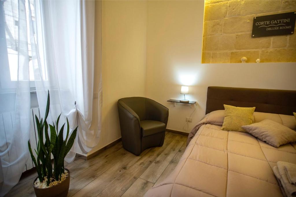 Postel nebo postele na pokoji v ubytování Corte Gattini Rooms