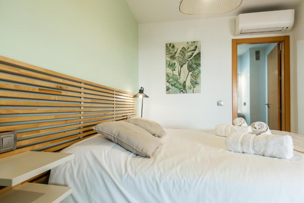 Posteľ alebo postele v izbe v ubytovaní Teatro Suites Málaga CITY FLAT