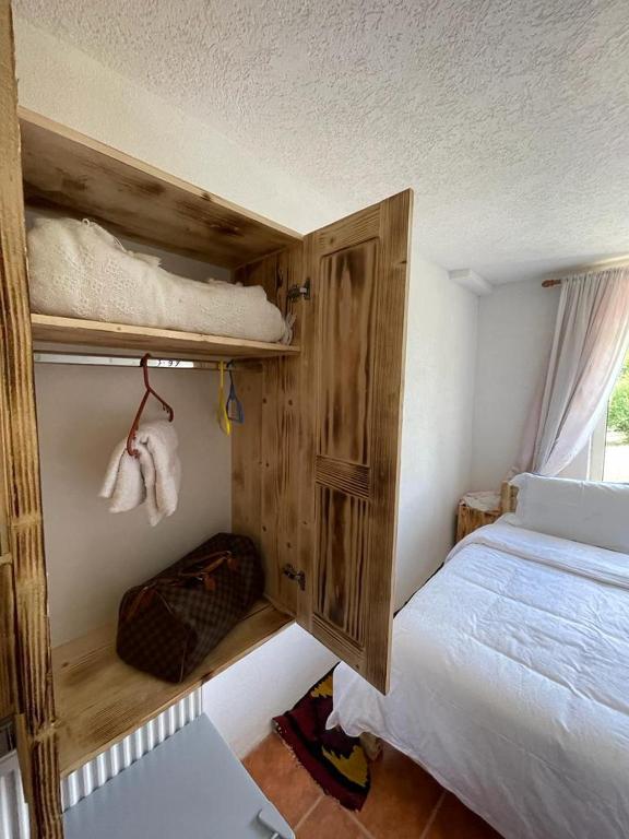 Postel nebo postele na pokoji v ubytování Hotel Kelmendi