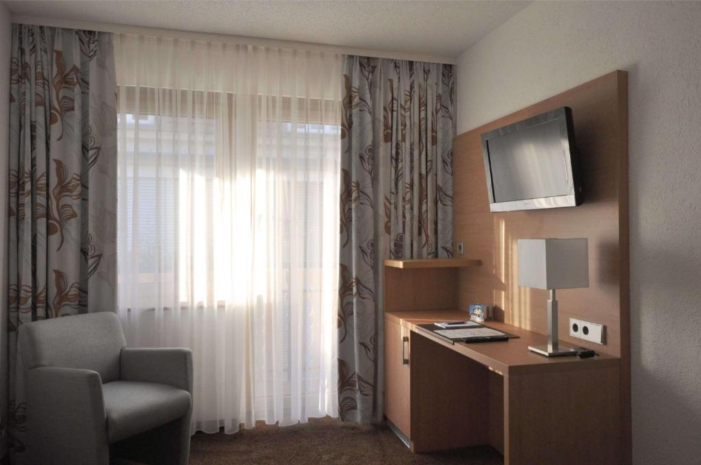 Kuchyň nebo kuchyňský kout v ubytování Hotel-Pension-Jasmin