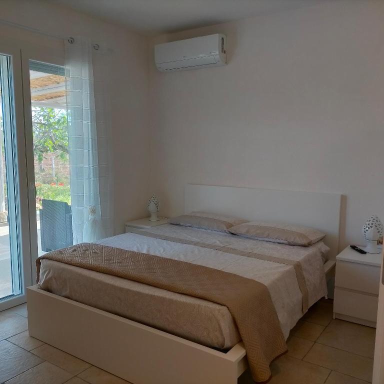 Postel nebo postele na pokoji v ubytování M&M Luxury