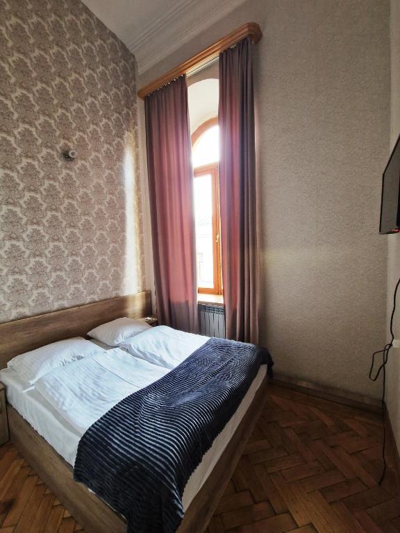 Postel nebo postele na pokoji v ubytování Friendly Hotel by Art Nova
