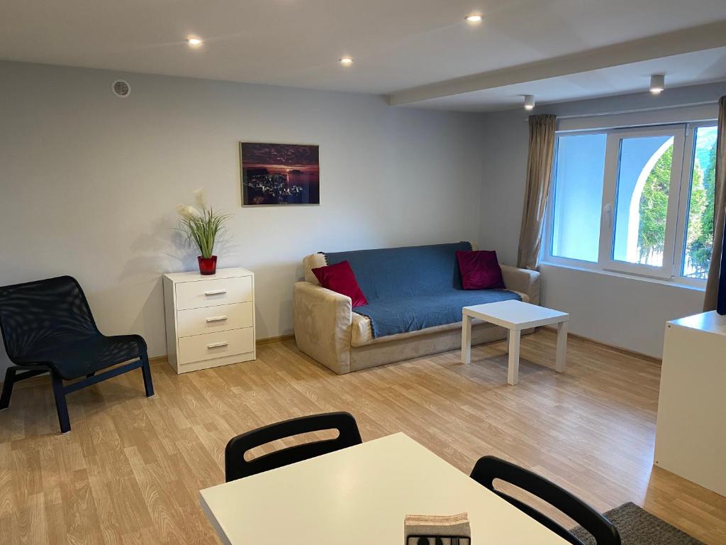 Χώρος καθιστικού στο Sukkertoppen Apartment