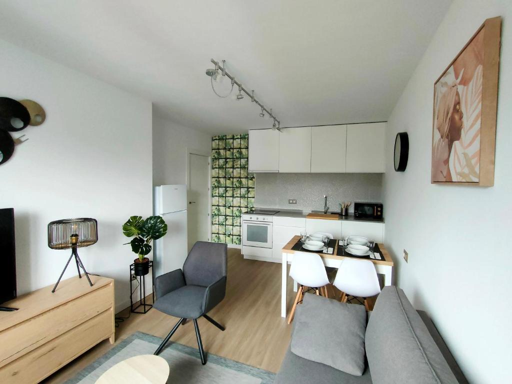A kitchen or kitchenette at Second Home Arzúa apartamentos