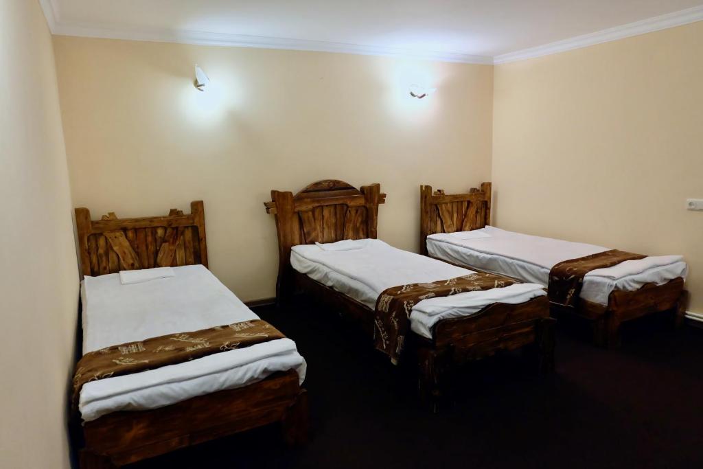 Postel nebo postele na pokoji v ubytování Dil Hill by Sam