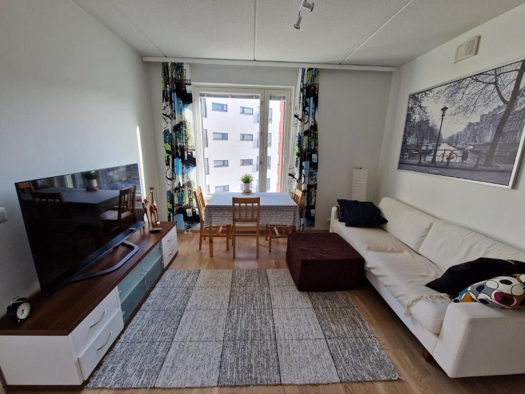 Et opholdsområde på Kalevan loisto - 40m2 Scandinavian apartment in Tampere