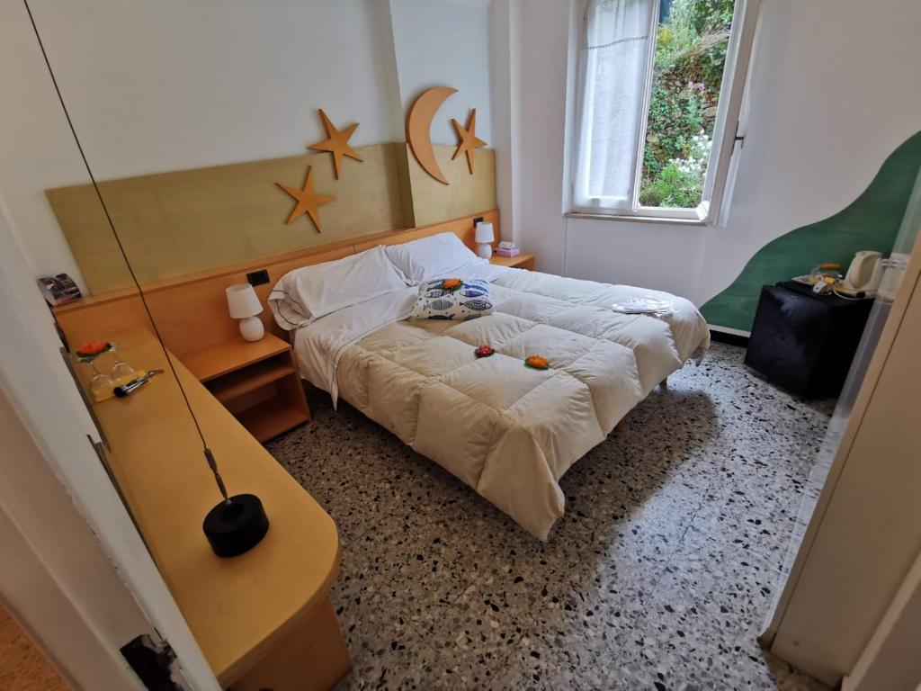 Posteľ alebo postele v izbe v ubytovaní Tonino Basso camere Nuova Gestione