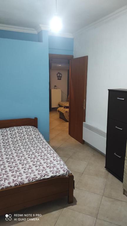 Postel nebo postele na pokoji v ubytování Sam