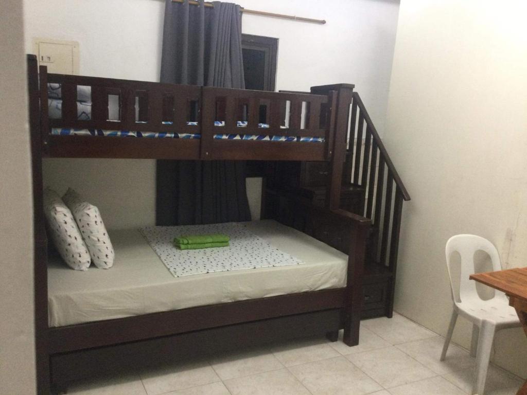 Postel nebo postele na pokoji v ubytování Bolinao Transient House B