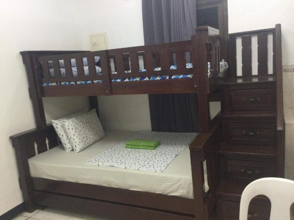 Postel nebo postele na pokoji v ubytování Bolinao Transient House B