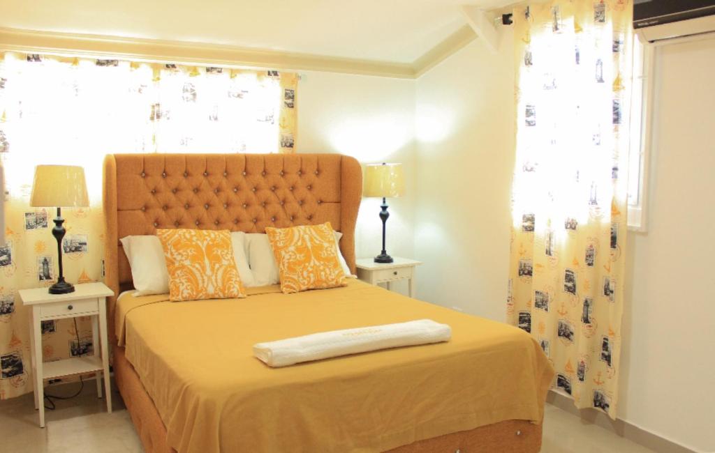 Ένα ή περισσότερα κρεβάτια σε δωμάτιο στο Fully Equipped New 2br Apt-dt2mins To The Beach