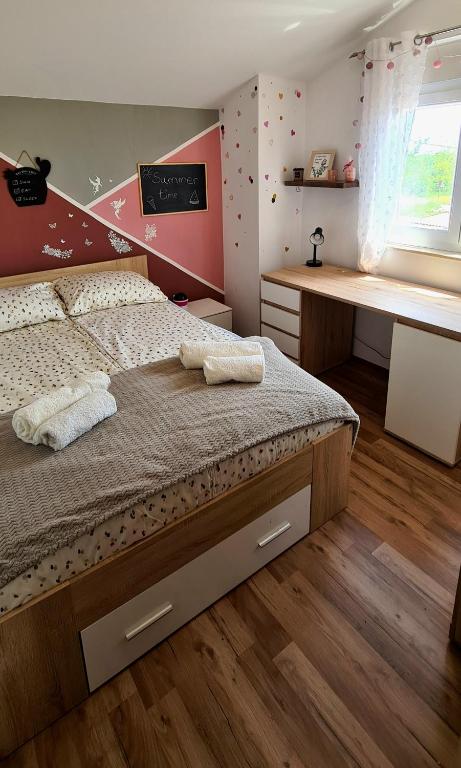 Posteľ alebo postele v izbe v ubytovaní Apartment Tena